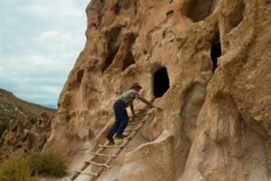 Bandelier Tom climbs